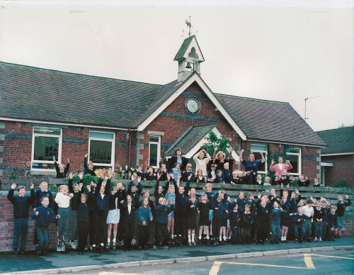 Image: photo of the village school and children